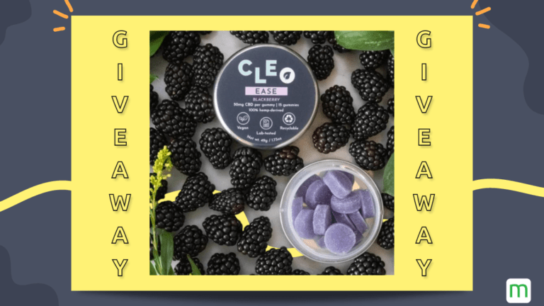 CLEO CBD gummies sitting on top of blackberries