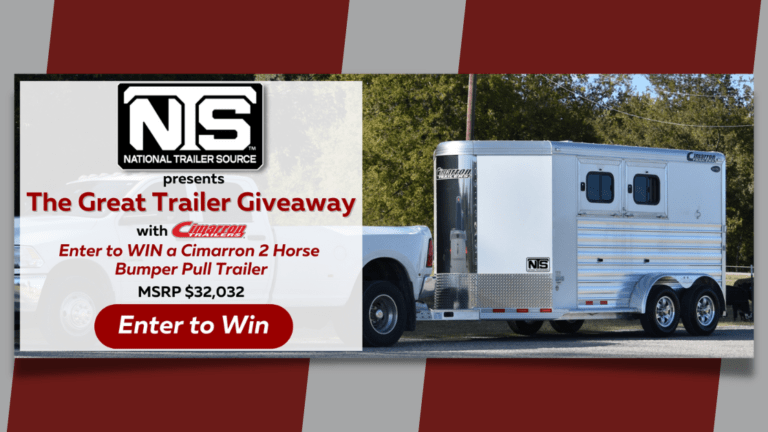 Trailer being pulled by truck, $32,000 trailer giveaway.